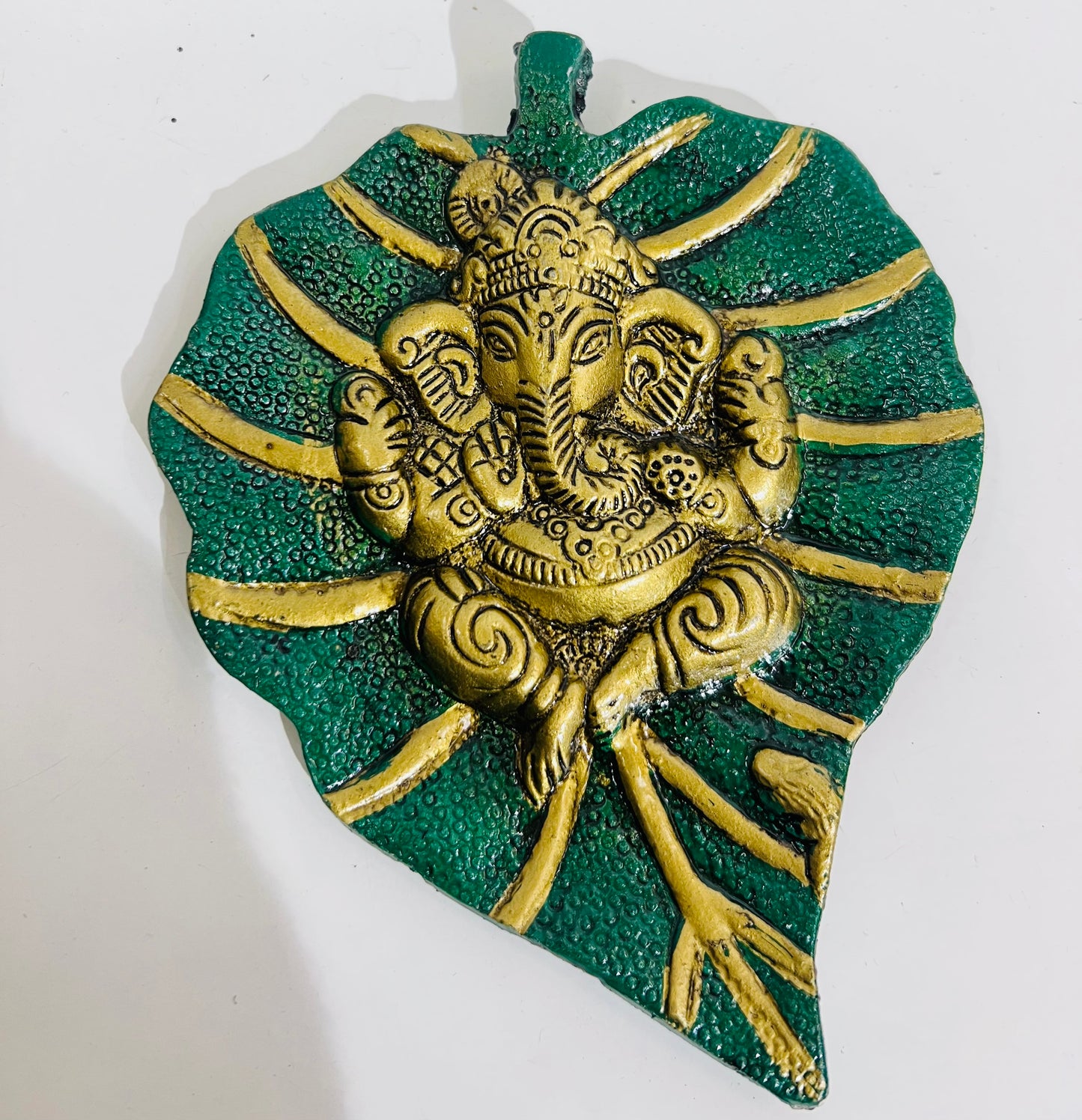 CHANDNI COLLLECTION rendy Crafts Metal Lord Ganesha on Leaf Wall Hanging (Multicolour, Medium), figures;Religious