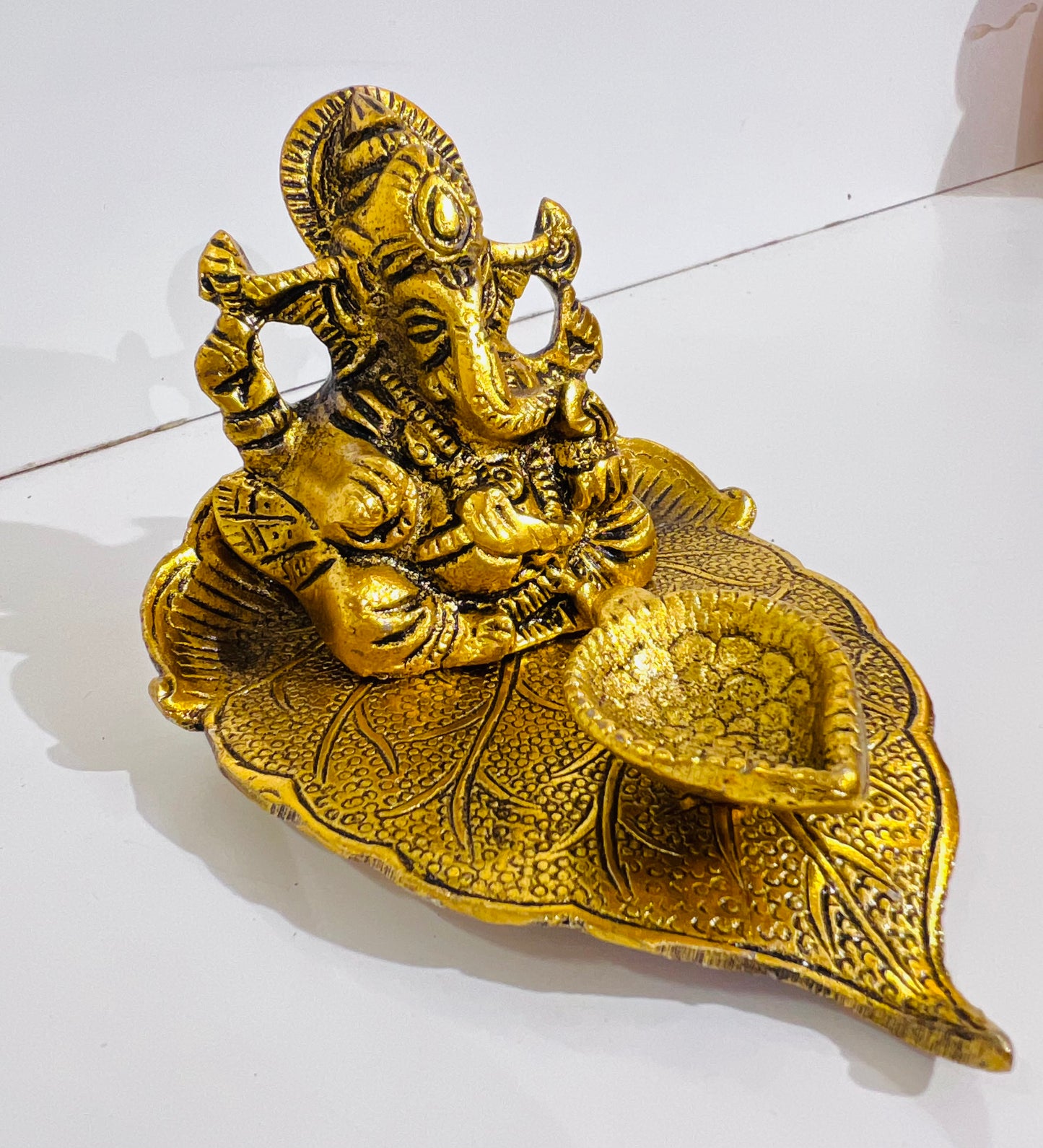 CHANDNI COLLECTION Idol Golden Small Ganesh on Leaf with Diya for Home Ganpati Figurine Luck & Success Diwali Pooja